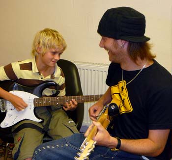 Dave teaching guitar at the CMA